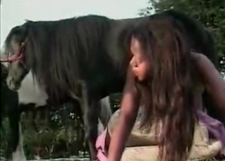Ebony takes a part in homemade bestiality XXX