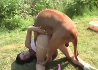 Slender chick is enjoying her trained animal