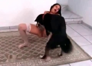 Black dog fucked her hole in missionary pose