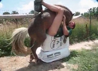Dude is playing naked with his stallion