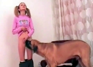 Miniature zoophile slut and her big doggy