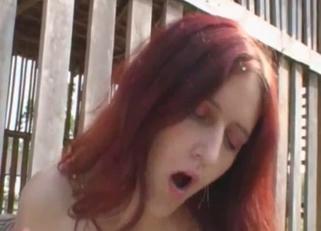 Redhead hottie is sucking a huge horse cock