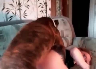 Sexy nerdy chick kisses her trained dog