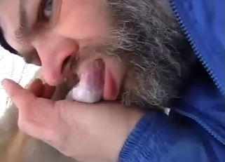 Dirty bearded male is sucking dog dick